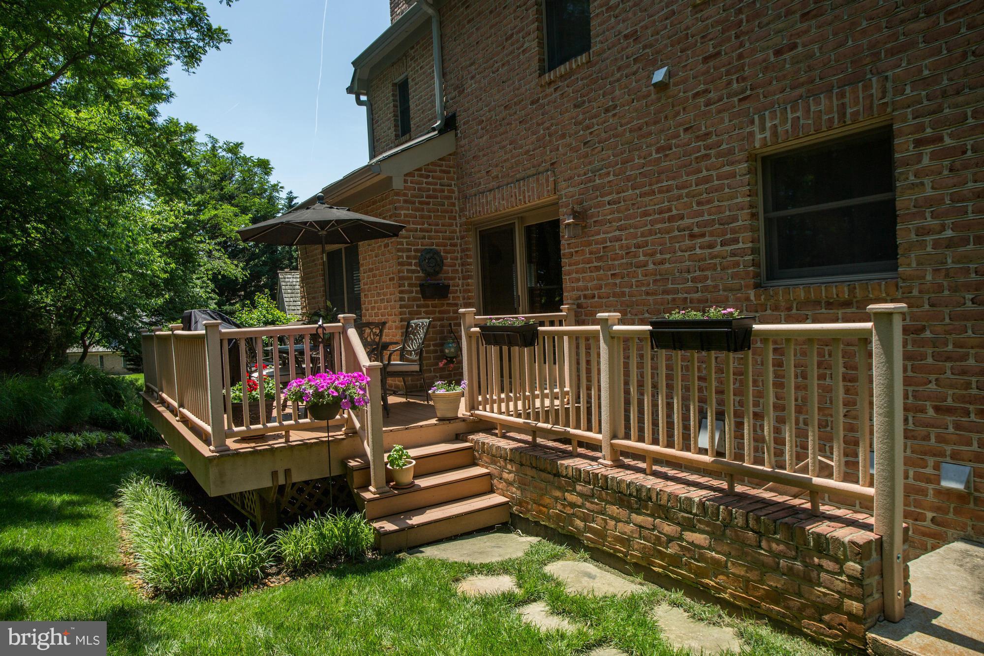 150 South River Landing Road, Unit 150 Edgewater, MD 21037 - Photo 22 of 28 a view of a roof deck with couches and wooden floor