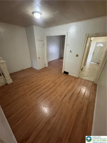 a view of a livingroom with wooden floor