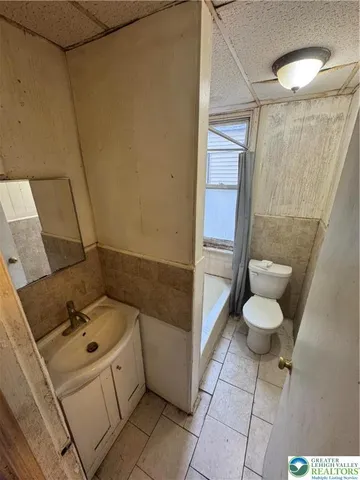 a bathroom with a sink and a shower