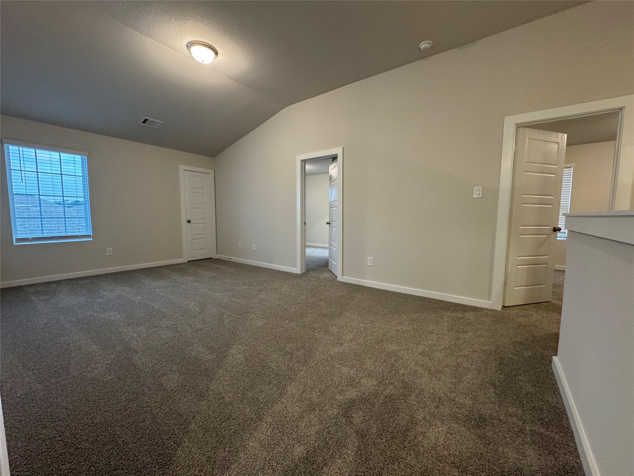 18731 Frost Ridge Drive Crosby, TX 77532 - Photo 17 of 26 an empty room with windows and closet