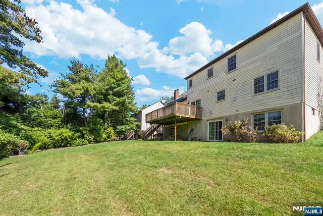 a view of a house with a big yard