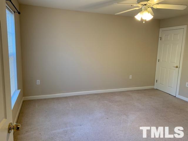 929 Morreene Road, Unit C21 Durham, NC 27705 - Photo 8 of 9 a view of an empty room with a window