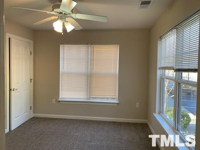 929 Morreene Road, Unit C21 Durham, NC 27705 - Photo 9 of 9 a view of an empty room with a window