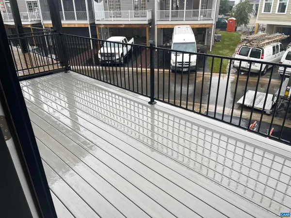 a view of staircase with white walls and a stairs