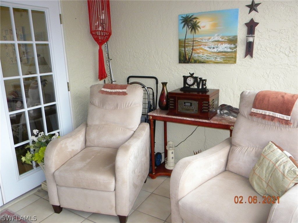 2121 Collier Avenue, Unit 102 Fort Myers, FL 33901 - Photo 12 of 28 a living room with furniture and a window