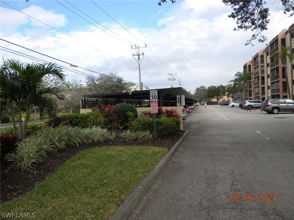 2121 Collier Avenue, Unit 102 Fort Myers, FL 33901 - Photo 15 of 28 a view of a city street with tall buildings