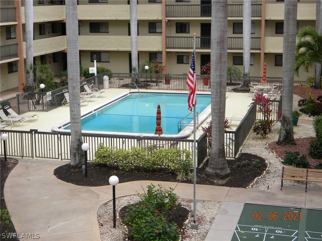 2121 Collier Avenue, Unit 102 Fort Myers, FL 33901 - Photo 23 of 28 a view of an chairs and tables in the patio