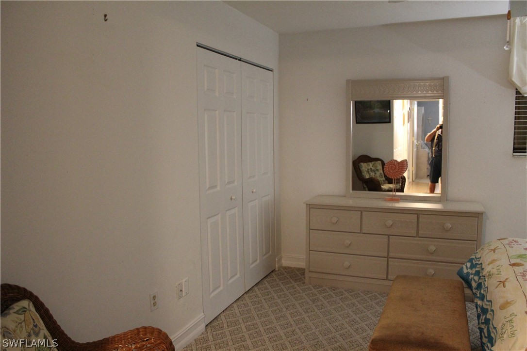 2121 Collier Avenue, Unit 102 Fort Myers, FL 33901 - Photo 8 of 28 a bathroom with a sink and mirror