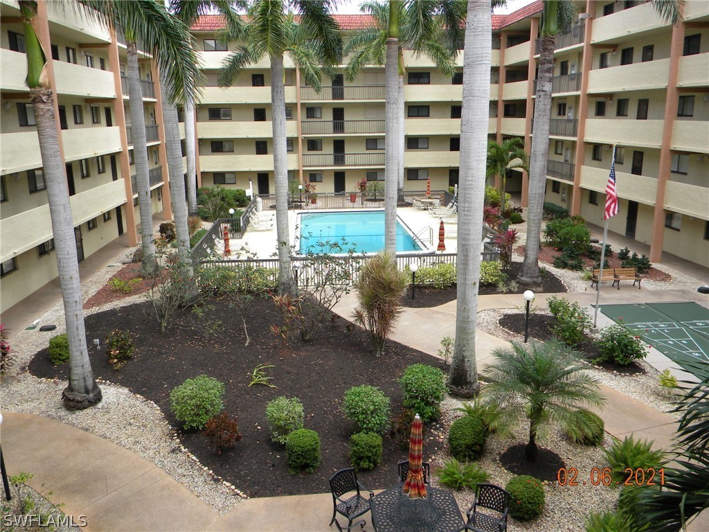 2121 Collier Avenue, Unit 102 Fort Myers, FL 33901 - Photo 10 of 28 a front view of a building with a street
