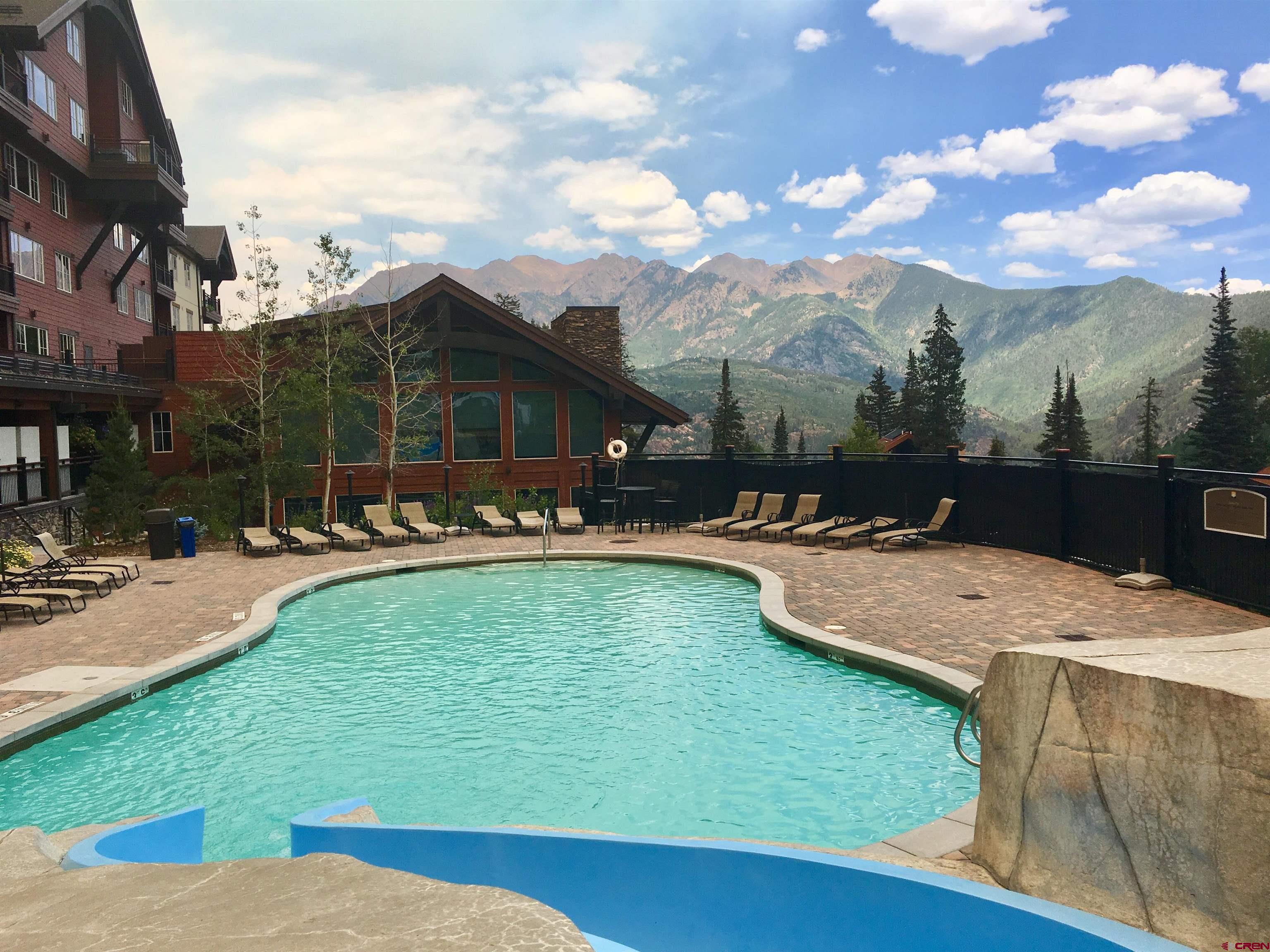 49789 Highway 550 Durango, CO 81301 - Photo 20 of 35 a view of a swimming pool with a patio