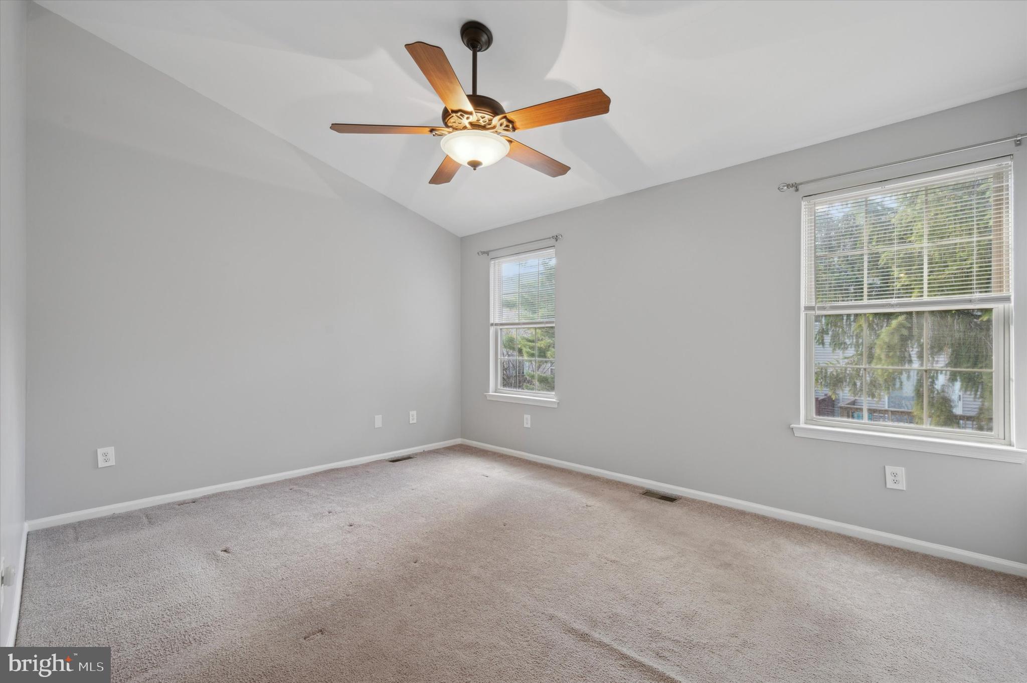 9 Meadow Lane Delran, NJ 08075 - Photo 12 of 15 an empty room with window and ceiling fan