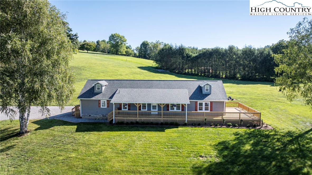 a view of a house with swimming pool