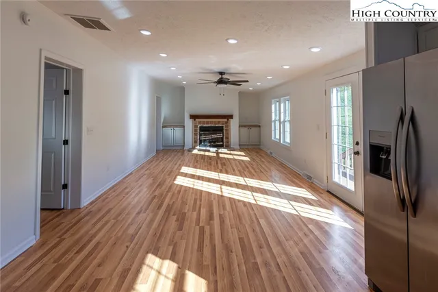 a view of a kitchen from the hallway