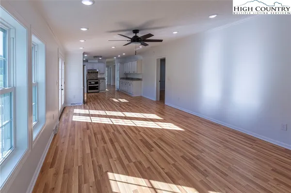 a view of a livingroom with wooden floor