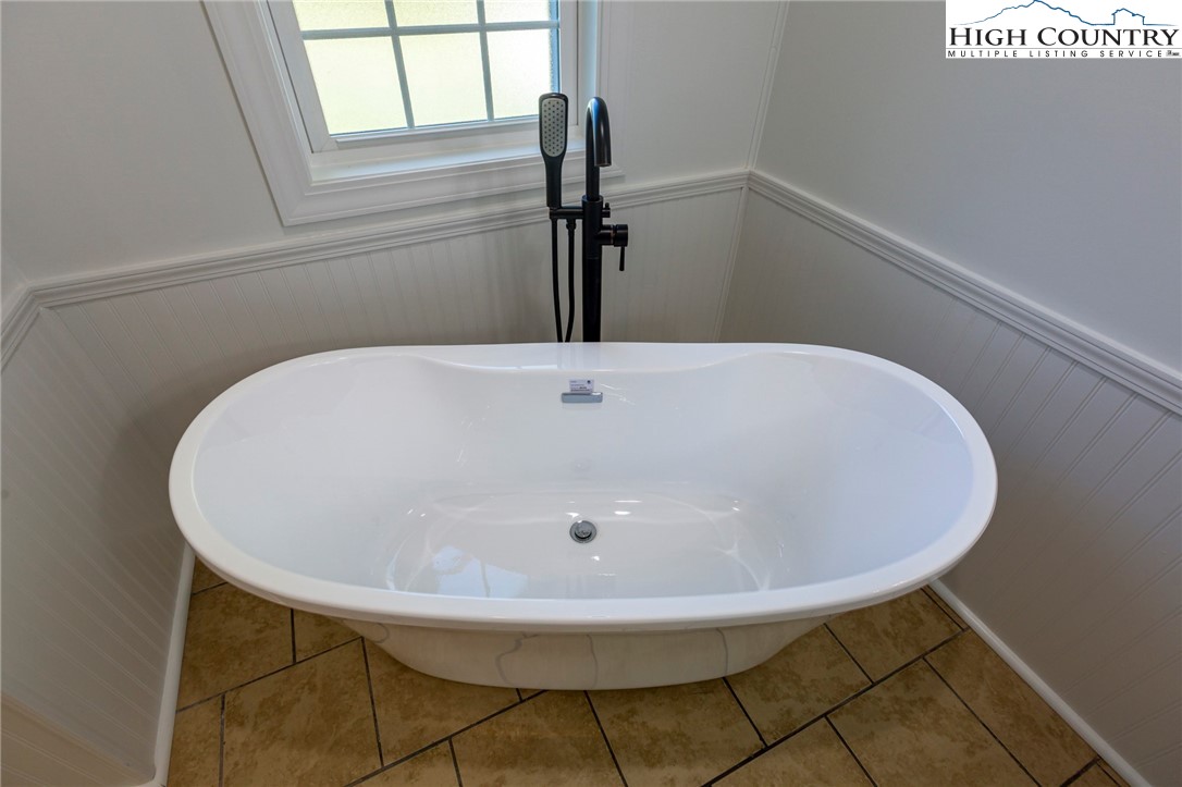 101 Beau Rivage Drive Crumpler, NC 28617 - Photo 23 of 47 a bathroom with a sink