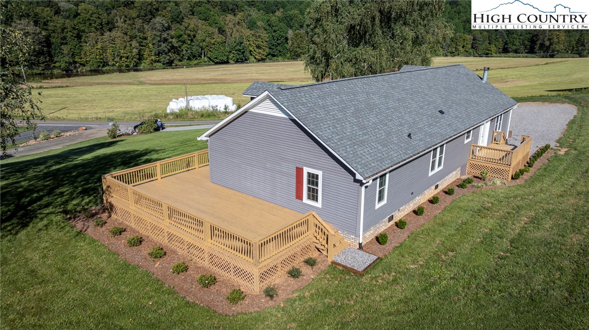 101 Beau Rivage Drive Crumpler, NC 28617 - Photo 4 of 47 a aerial view of a house with a yard