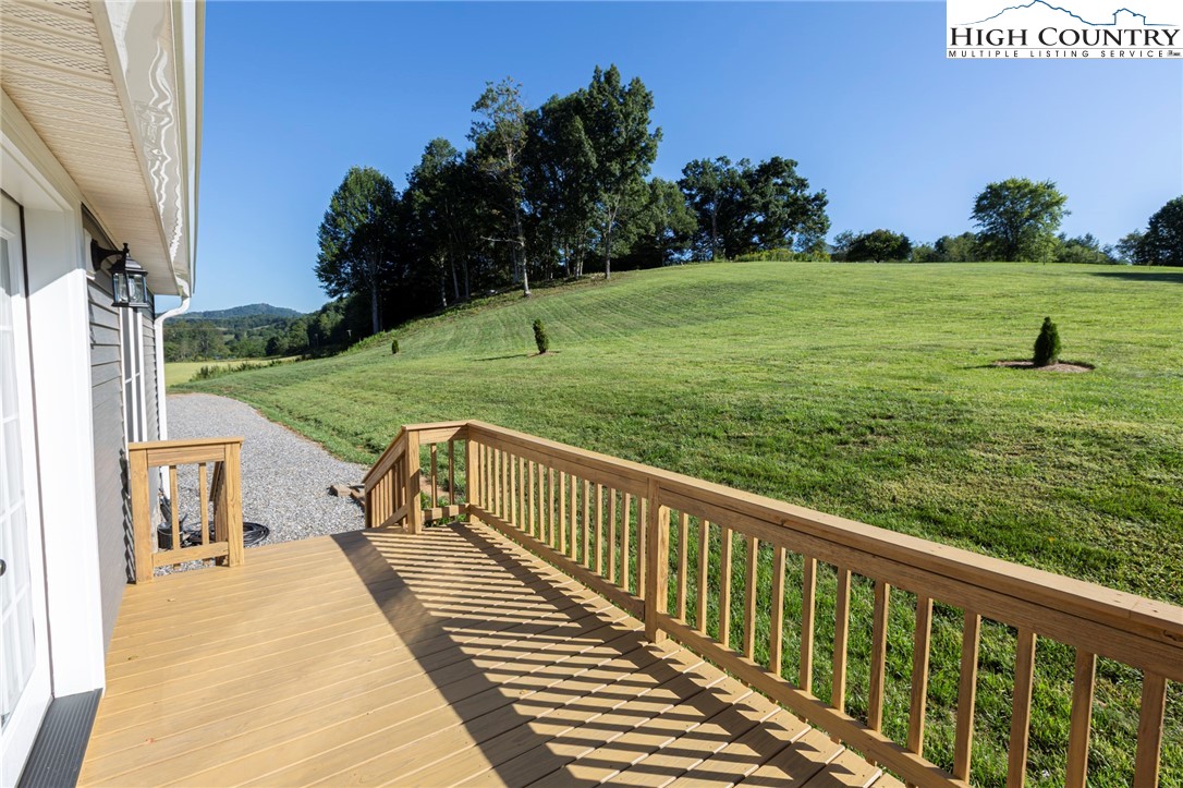 101 Beau Rivage Drive Crumpler, NC 28617 - Photo 41 of 47 a view of a garden and deck