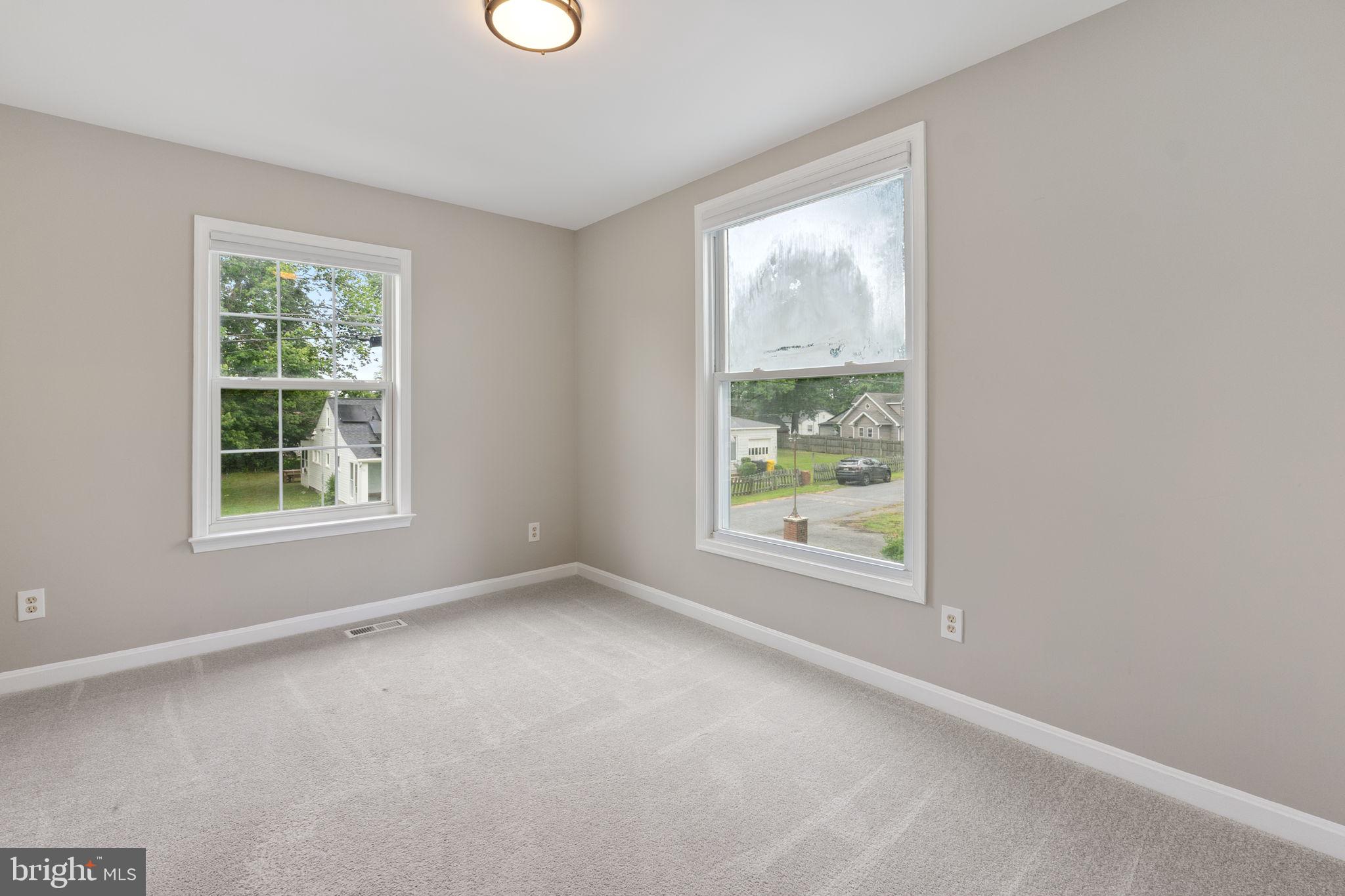 1527 Lincoln Road Shady Side, MD 20764 - Photo 19 of 30 an empty room with windows