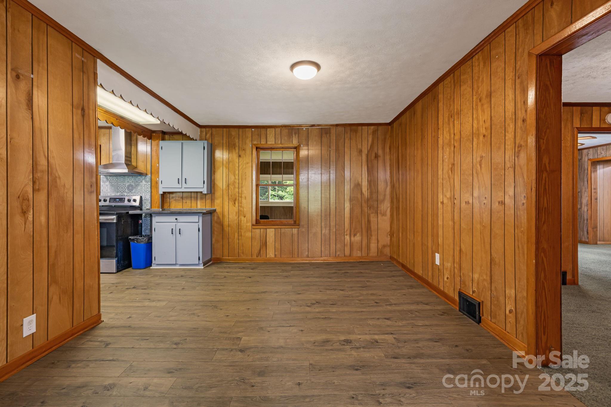 8171 Sugar Hill Road Marion, NC 28752 - Photo 13 of 27 a view of a kitchen with wooden cabinet and stainless steel appliances