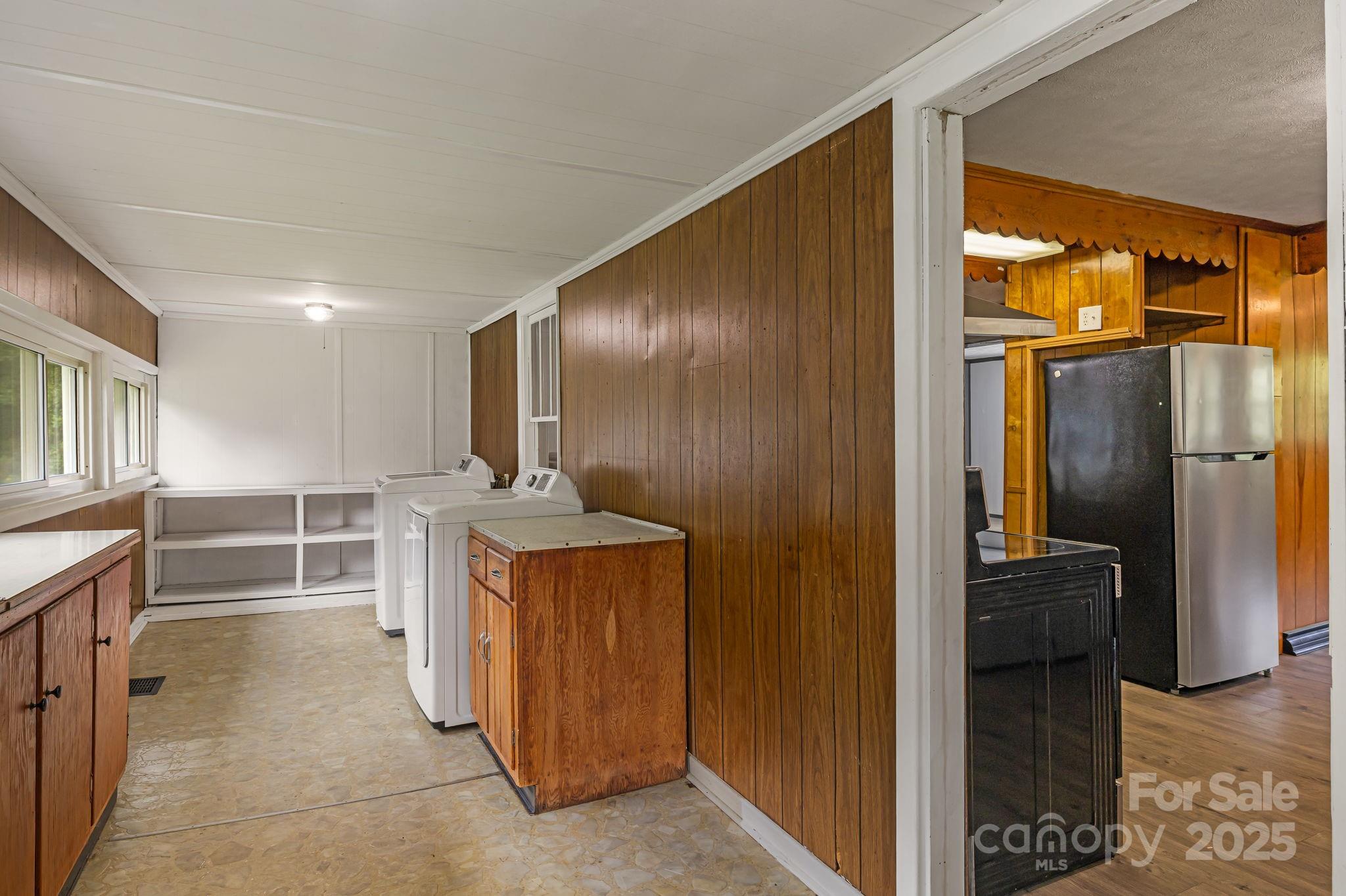 8171 Sugar Hill Road Marion, NC 28752 - Photo 25 of 27 a kitchen with stainless steel appliances granite countertop a refrigerator and a sink