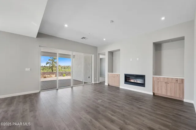 a view of kitchen with wooden floor