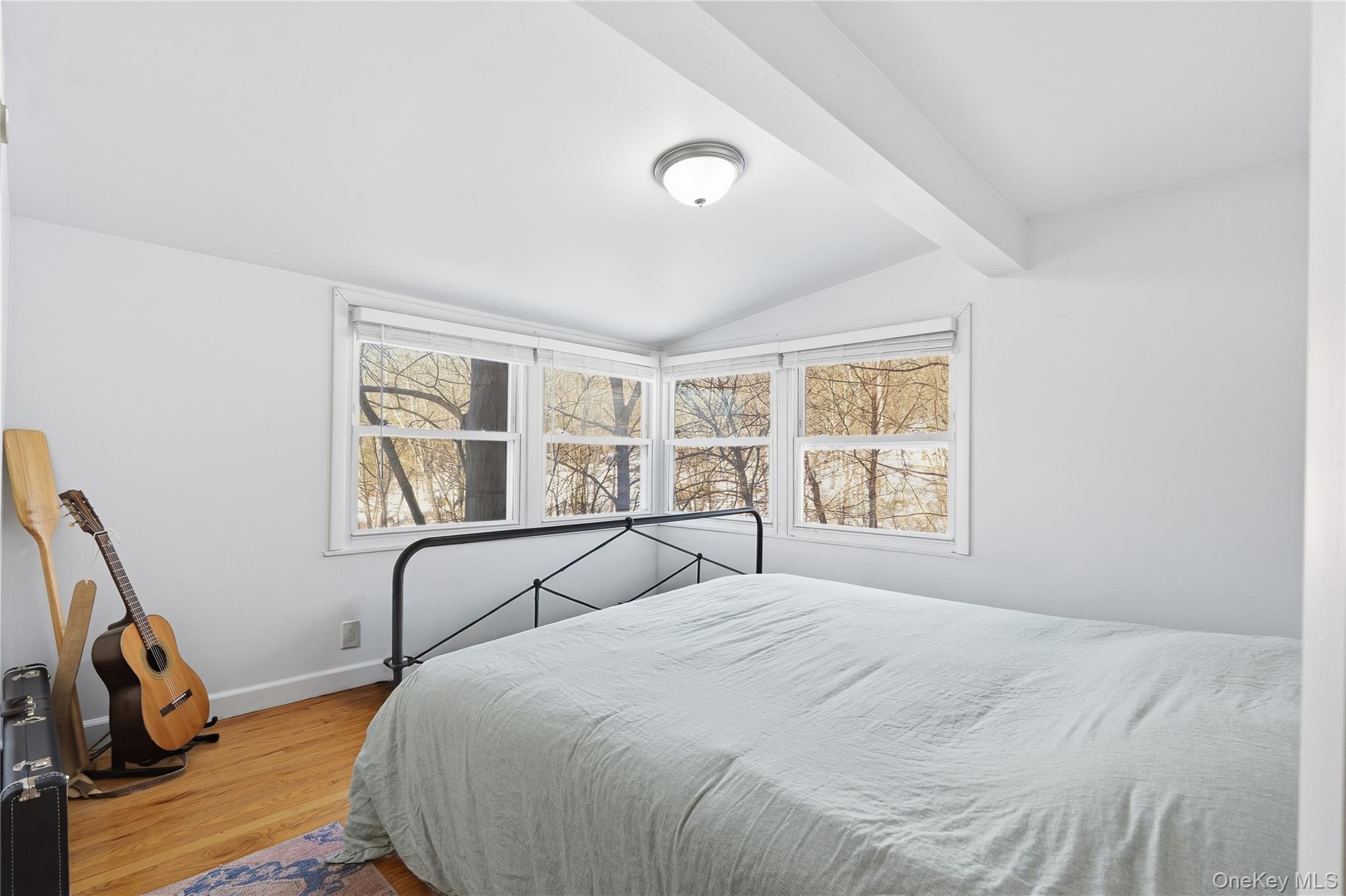 37 Sawmill Road Putnam Valley, NY 10579 - Photo 19 of 23 a bedroom with a bed and a window