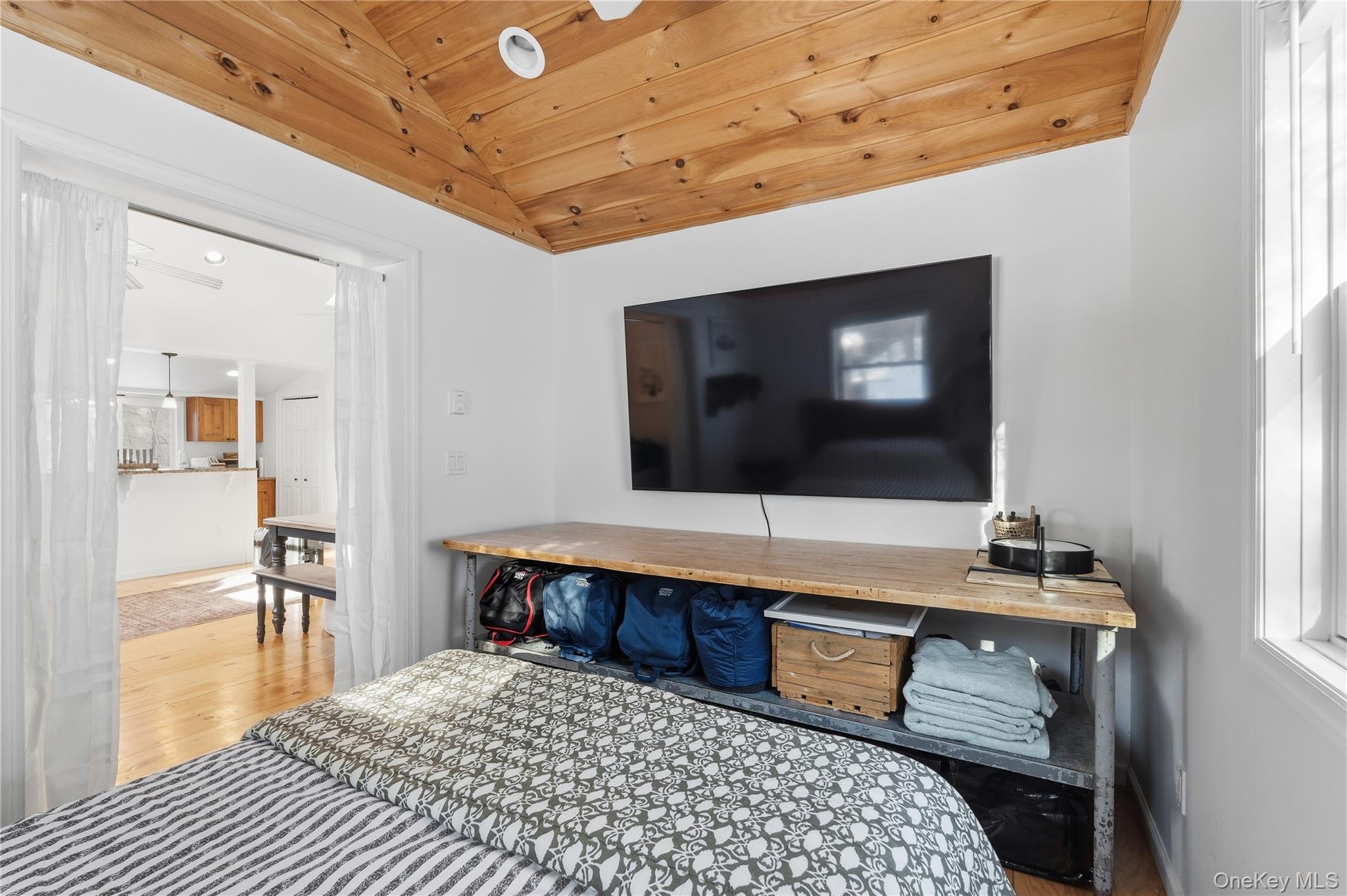 37 Sawmill Road Putnam Valley, NY 10579 - Photo 20 of 23 a room with furniture and a flat screen tv