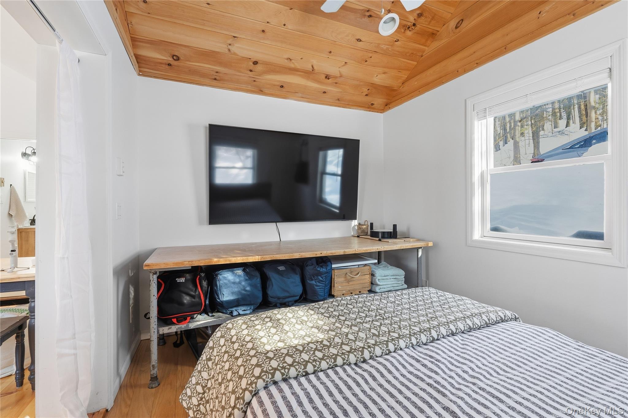 37 Sawmill Road Putnam Valley, NY 10579 - Photo 21 of 23 a bedroom with a bed and window