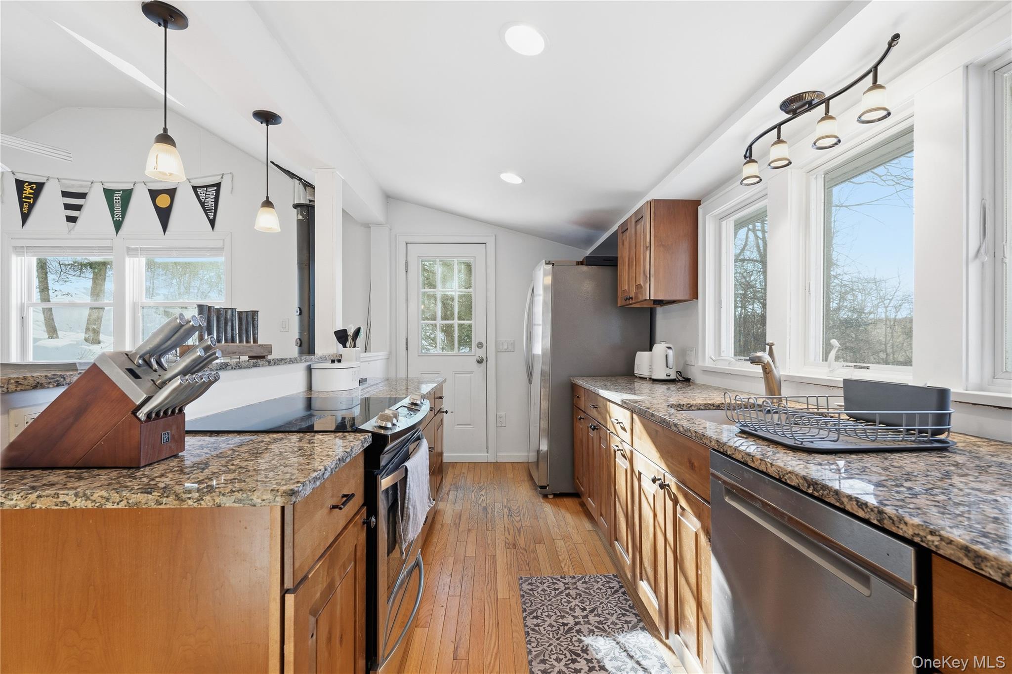 37 Sawmill Road Putnam Valley, NY 10579 - Photo 10 of 23 a kitchen with granite countertop a sink a counter top space and stainless steel appliances