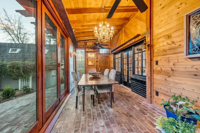 a view of a livingroom with furniture and a window
