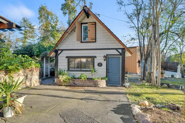 a view of room with walk in closet and bedroom