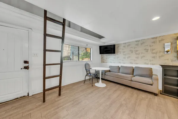 a kitchen with a stove and a refrigerator