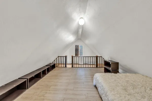 a view of a house with backyard porch and sitting area
