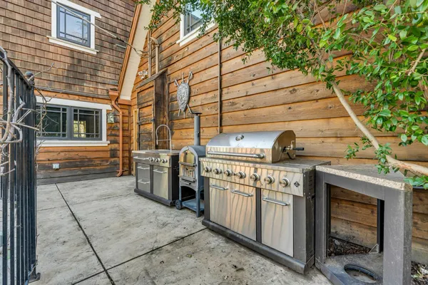 a view of a house with swimming pool and porch