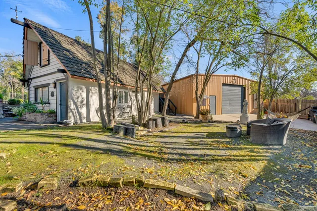 a house view with a outdoor space