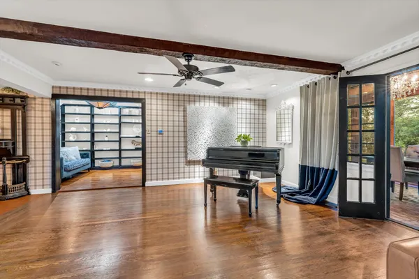 a lobby with furniture and wooden floor