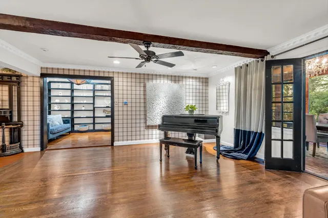 a lobby with furniture and wooden floor