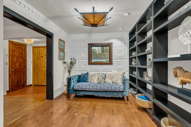 a living room with furniture and a rug