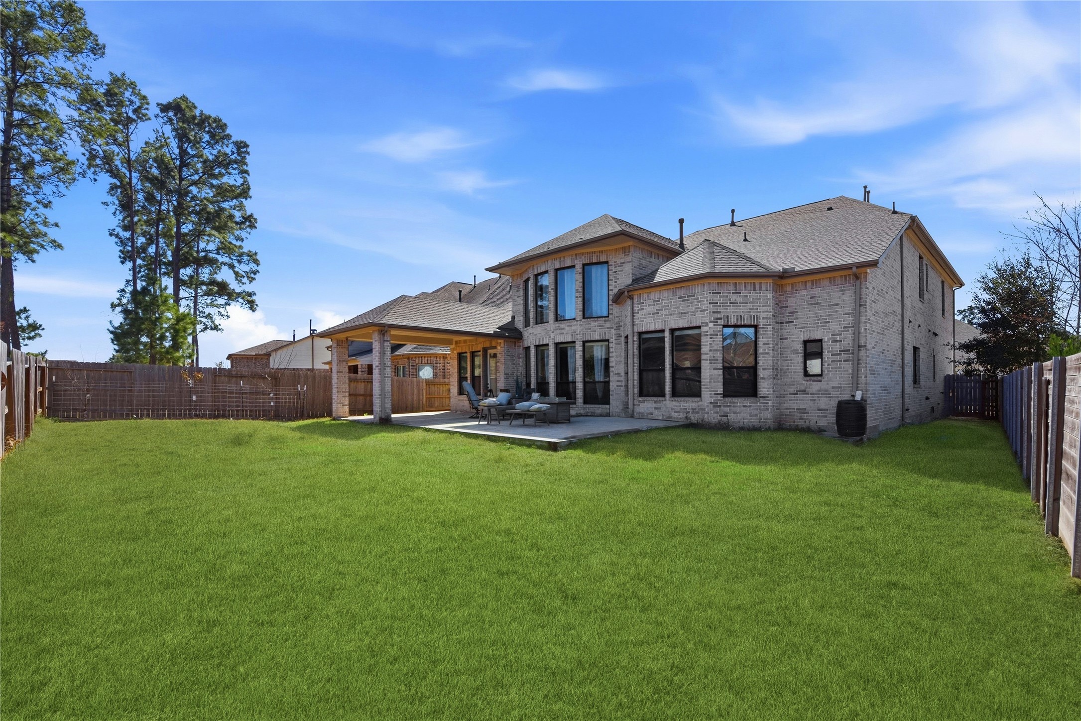 17501 Spice Merlot Lane Conroe, TX 77302 - Photo 50 of 50 a view of a house with a big yard plants and large trees