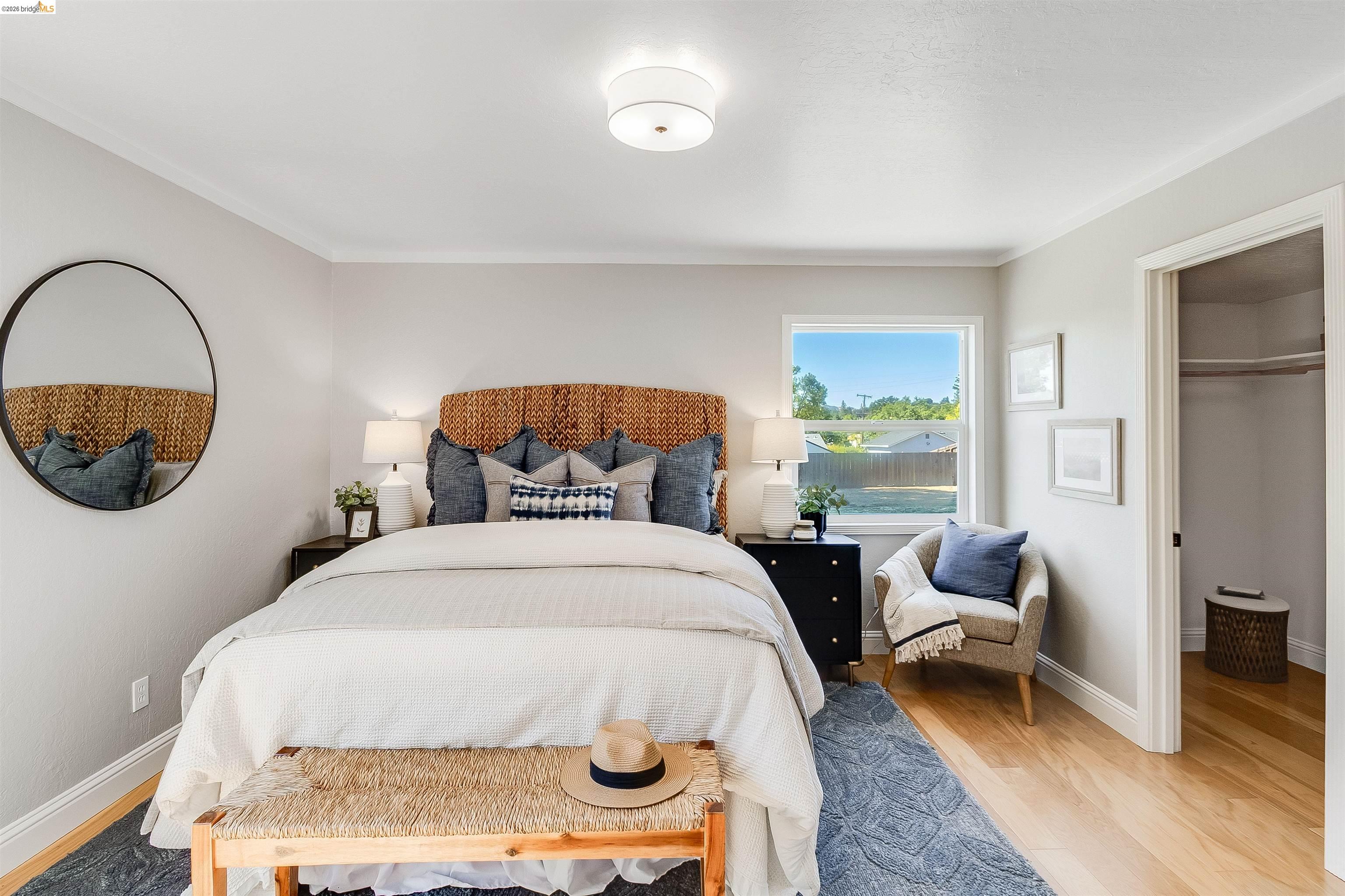 346 Valley View Road Pleasant Hill, CA 94523 - Photo 22 of 57 Bright bedroom with wood-finish flooring and a window offering outdoor scenery