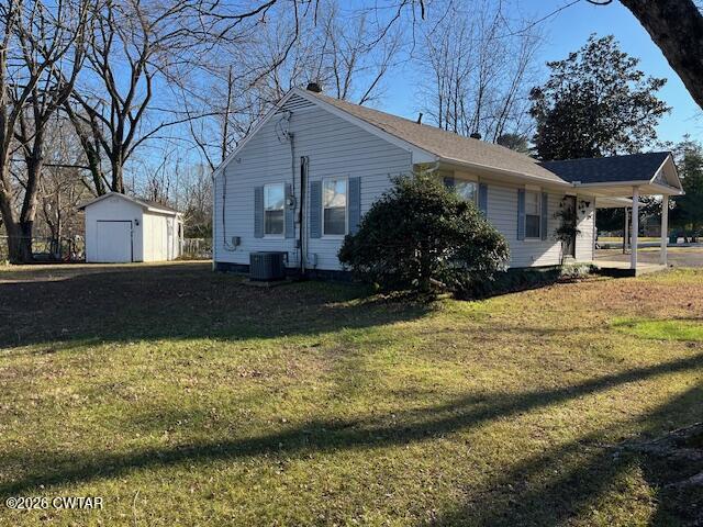 4036 Hawthorne Street Milan, TN 38358 - Photo 12 of 13 a view of a house with a swimming pool