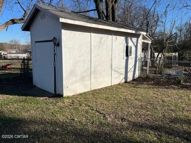 a view of a backyard of a house