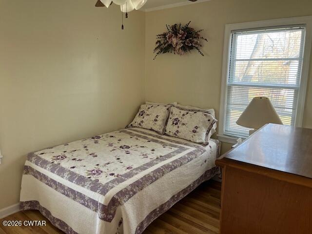 4036 Hawthorne Street Milan, TN 38358 - Photo 8 of 13 a bedroom with a bed and a window