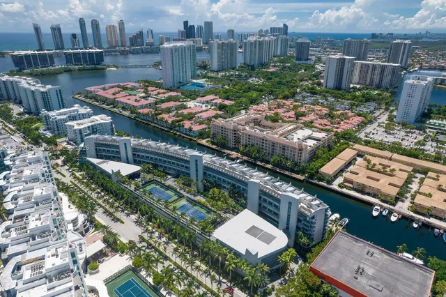 a balcony with furniture and a city view