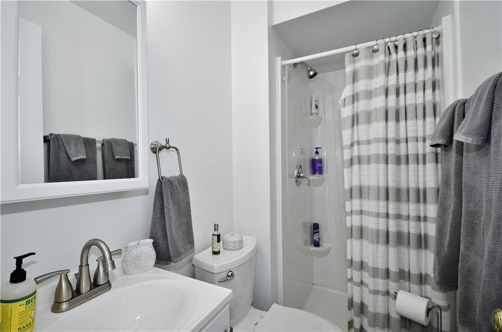 1125 Valleyview Drive Lawrence, PA 15055 - Photo 33 of 35 a bathroom with a sink toilet and shower