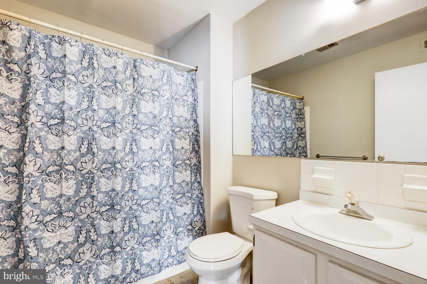 425 Valleybrook Drive Lancaster, PA 17601 - Photo 17 of 50 a bathroom with a sink toilet and a mirror