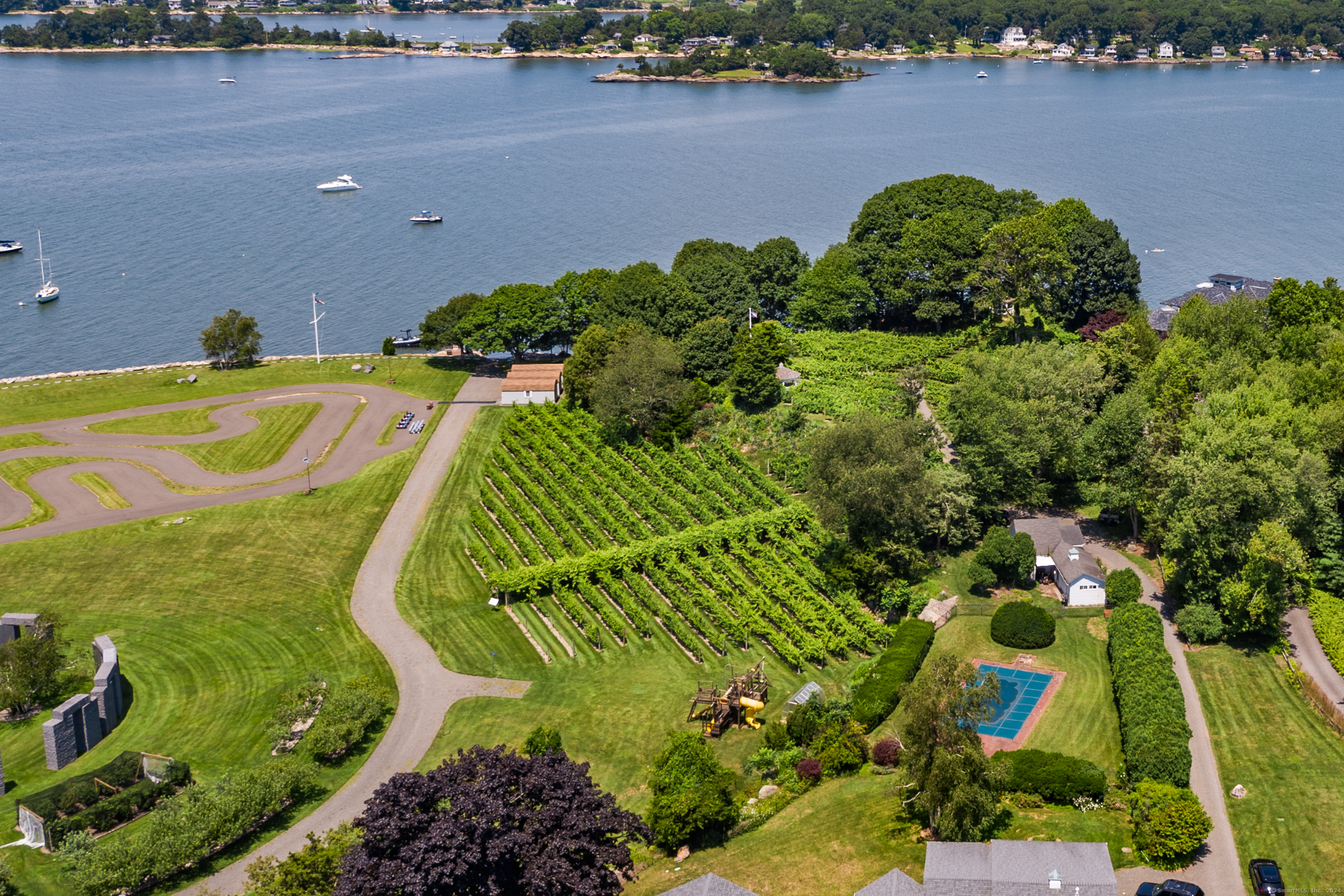 215 Uncas Point Road Guilford, CT 06437 - Photo 9 of 40 175 Uncas Point wth GO Cart Track, Dock, Vineyard and Orchards
