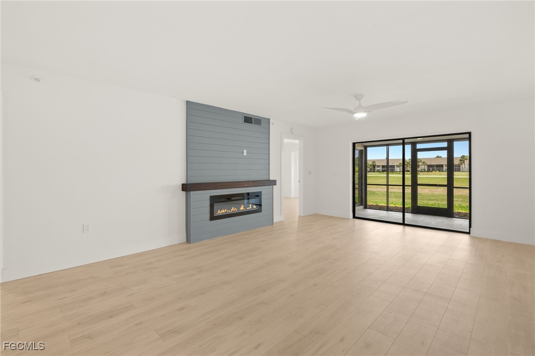 16260 Kelly Cove Drive, Unit 235 Fort Myers, FL 33908 - Photo 7 of 30 a view of an empty room with a window