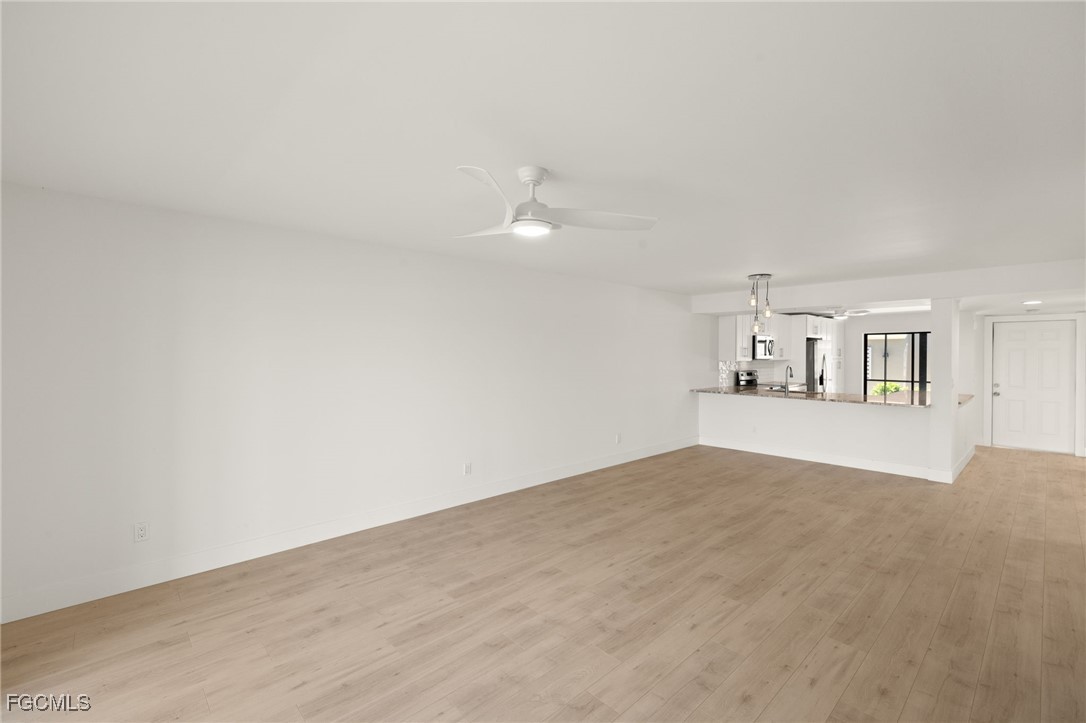 16260 Kelly Cove Drive, Unit 235 Fort Myers, FL 33908 - Photo 9 of 30 a view of an empty room with closet
