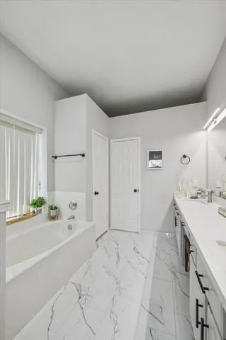 a room with a bed and a cabinets